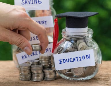 One jar full of money says retirement while another says education