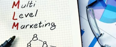 A notebook says multi level marketing.